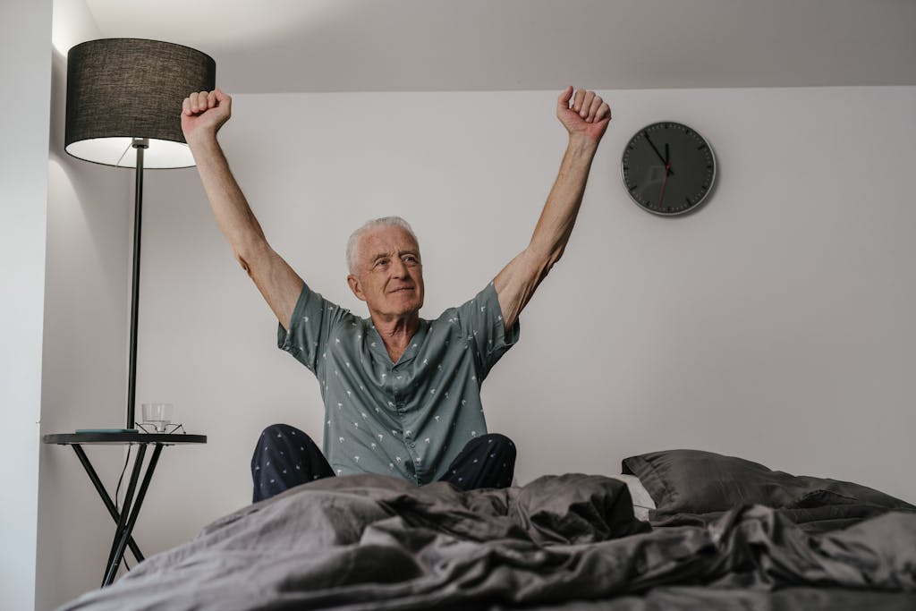 Man wake rejuvenated after excellent bedtime routine. 